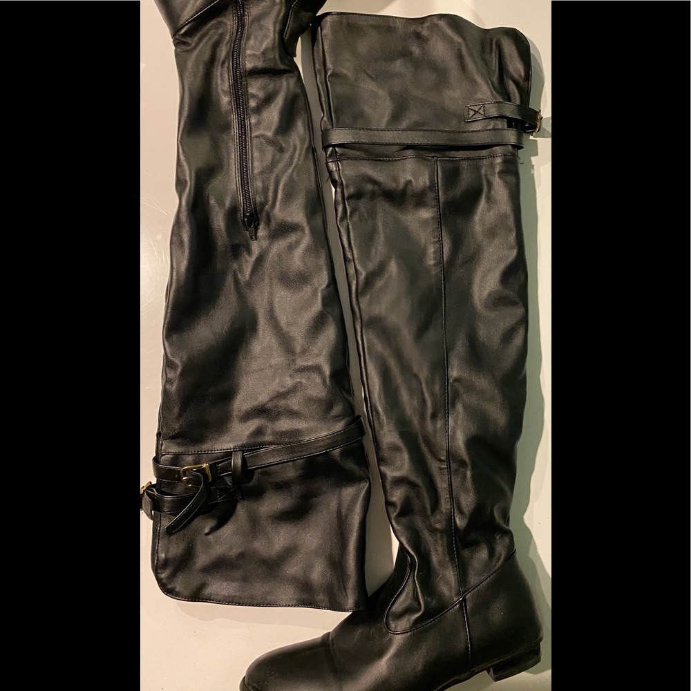 A beautiful black over the knee boots